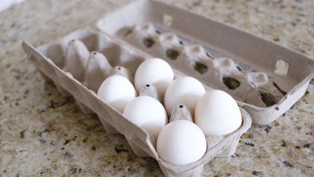 Open Carton of Eggs on Kitchen Counter 
