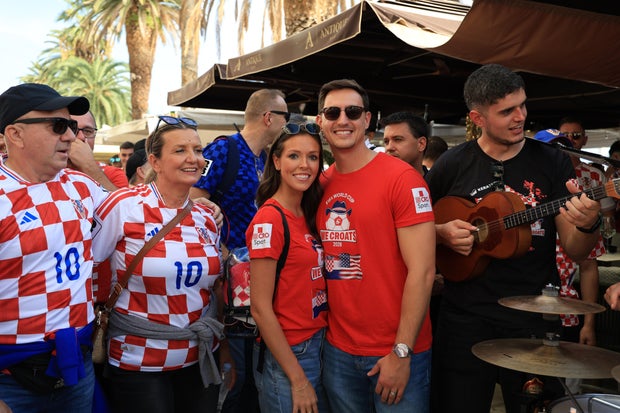 Ashton and Zachary Smith pose with Croatian supporters in Split, Croatia