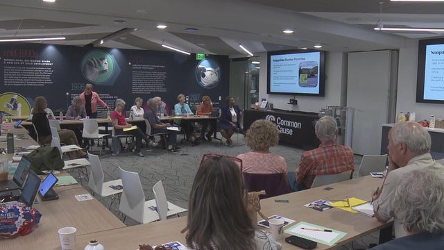 Volunteer poll watchers in Colorado receive training over midterm election responsibilities
