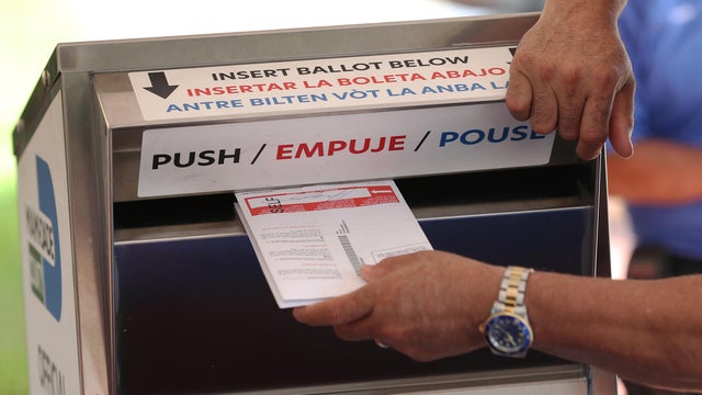 Florida Voters Drop Off Absentee Ballots In Special Boxes Ahead Of Election 