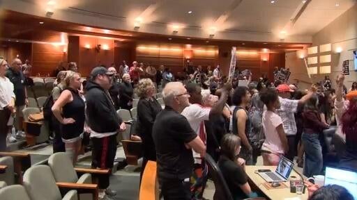 Aurora community members pack council chambers to oppose data center, chief of police