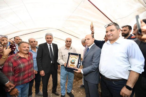 Khaled al-Shahat is recognized by Egyptian Minister of Tourism and Antiquities Sherif Fathy, Oct. 14, 2026. 