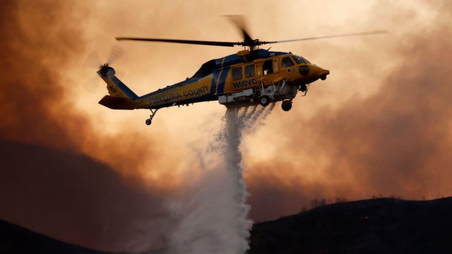 Firefighters battle California fires