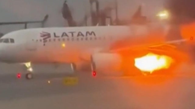 Flames shoot from plane engine before takeoff