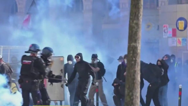 French rioters loot thousands of stores, torch cars and buildings