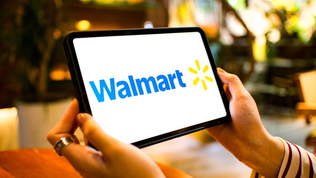 In this photo illustration, the Walmart logo is seen 