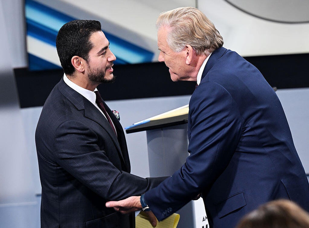Senate candidates Abdul El-Sayed, left, Mike Rogers shake hands after their debate on Oct. 21, 2026, at WXYZ-TV in Southfield, Michigan. Robin Buckson-Pool / Getty Images