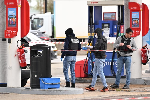 Forensics investigate scene of deadly shooting in Trappes, France 