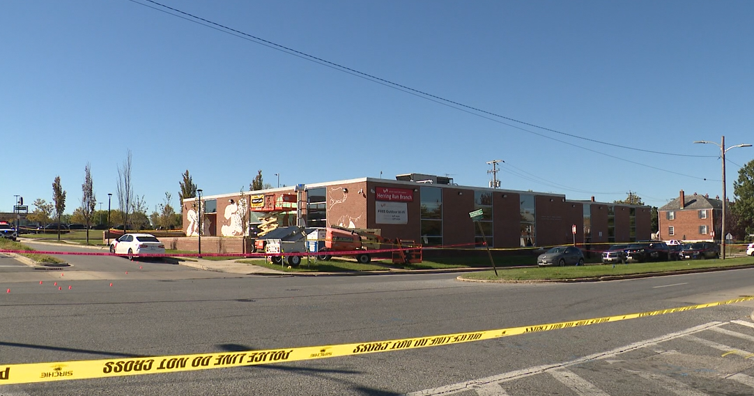 Police shoot armed man near Northeast Baltimore library, child care center