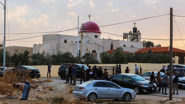 Security forces are seen after an attack on a Greek Orthodox church in Jordan's Karak governorate, Oct. 23, 2026, in a screengrab from video footage. 