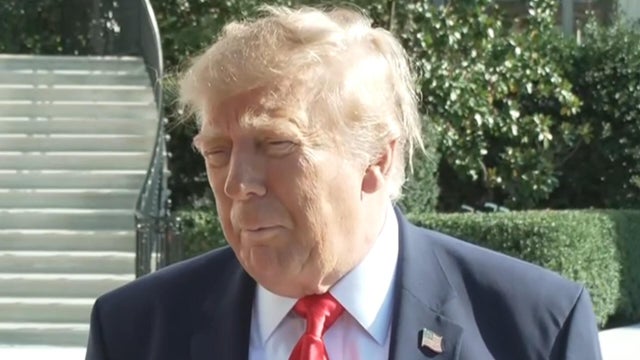 Trump takes questions from reporters