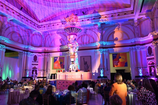 People pose for photos at a gala at the Please Touch Museu,