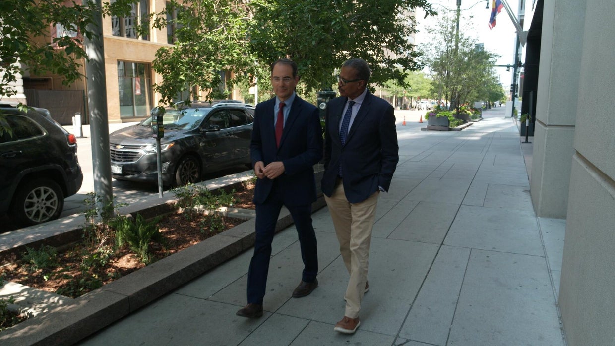 Phil Weiser and Bill Whitaker