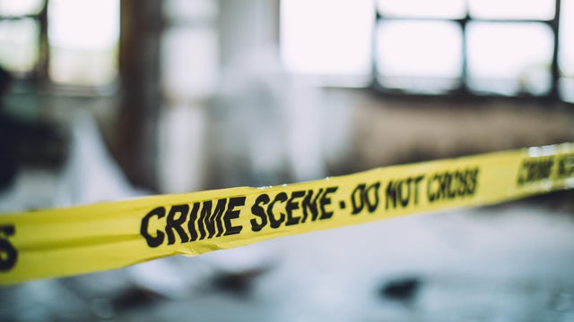 Cordon Tape On A Crime Scene 