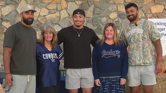Cowboys players help fill Thanksgiving boxes for North Texas families
