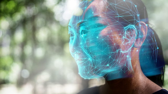 Futuristic and technological scanning of the face of woman 