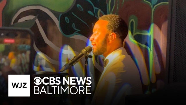 John Legend performs to crowd at Baltimore record store