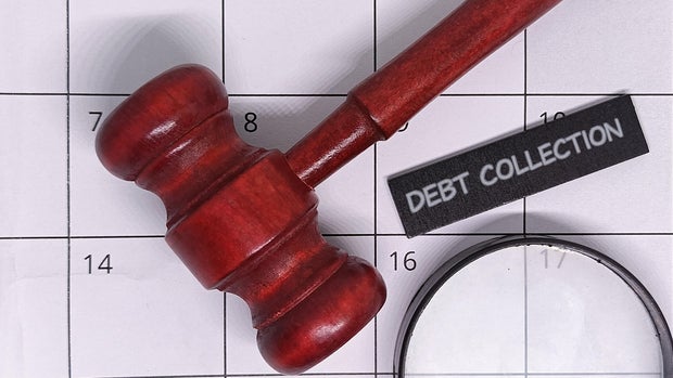 Debt collection deadline approaching fast with gavel and calendar ready for legal action and financial decisions
