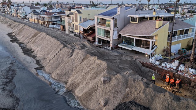 Reinforcement And Repair Work Performed Along Long Beach Boardwalk As High Tide Flooding Continues To Batter Coast 