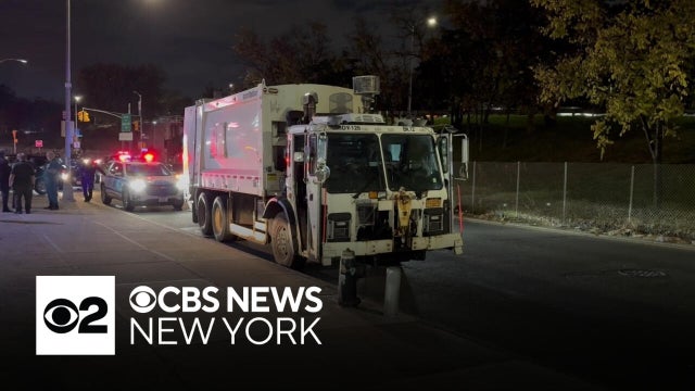 Woman dies after being struck by sanitation truck in Brooklyn, police say