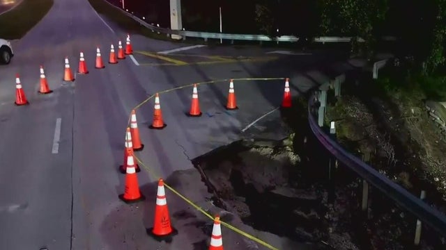 Davie road collapses after water main break, police say